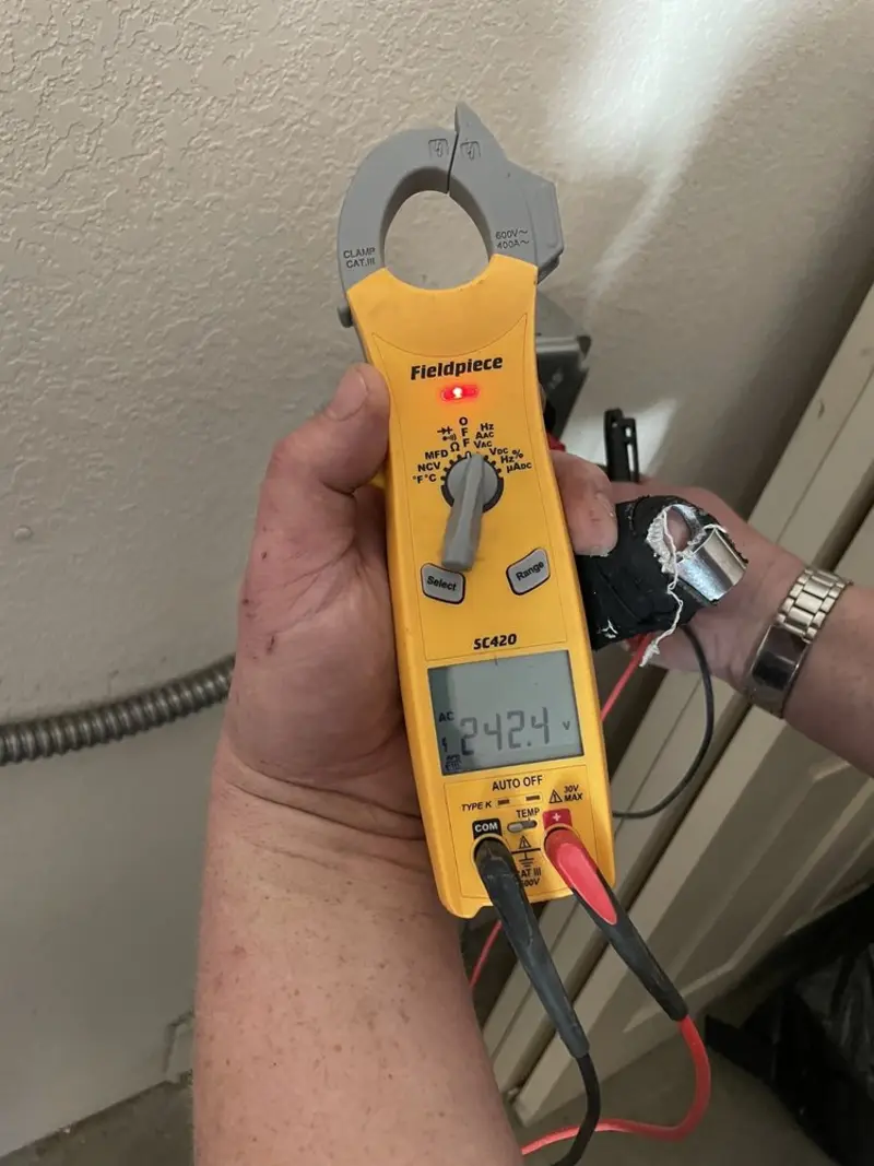 Voltage testing with clamp meter during Generator Installation in New Albany